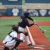 baseball player swinging bat