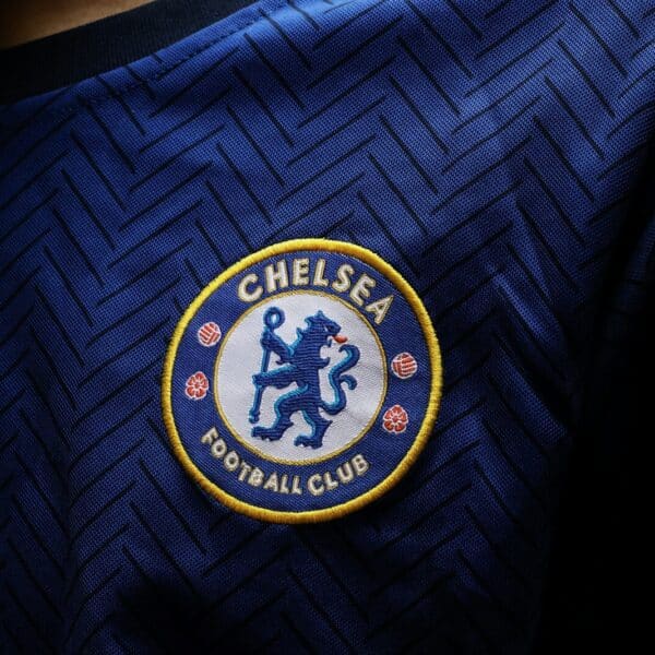a close up of the chelsea badge on a shirt